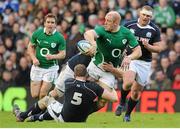 27 February 2011; Paul O'Connell, Ireland, is tackled by Alastair Kellock, Scotland. RBS Six Nations Rugby Championship, Scotland v Ireland, Murrayfield, Edinburgh, Scotland. Picture credit: Brendan Moran / SPORTSFILE