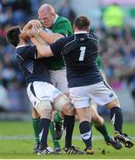 27 February 2011; Paul O'Connell, Ireland, is tackled by John Barclay, left, and Allan Jacobsen, Scotland. RBS Six Nations Rugby Championship, Scotland v Ireland, Murrayfield, Edinburgh, Scotland. Picture credit: Stephen McCarthy / SPORTSFILE