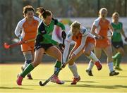 19 March 2015; Megan Frazer, Ireland, in action against Rominta Zukaite, Lithuania. World Hockey League 2, Quarter-Final, Ireland v Lithuania, National Hockey Stadium, UCD, Belfield, Dublin. Picture credit: Matt Browne / SPORTSFILE