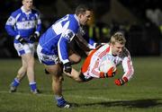 15 March 2008; Owen Mulligan, Tyrone, in action against Darren Rooney, Laois. Allianz National Football League, Division 1, Round 4, Tyrone v Laois, Healy Park, Omagh, Co. Tyrone. Picture credit; Michael Cullen / SPORTSFILE