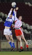 15 March 2008; Colin Holmes, Tyrone, in action against Kevin Meaney, Laois. Allianz National Football League, Division 1, Round 4, Tyrone v Laois, Healy Park, Omagh, Co. Tyrone. Picture credit; Michael Cullen / SPORTSFILE