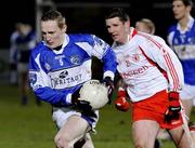 15 March 2008; Colin Holmes, Tyrone, in action against Peter O'Leary, Laois. Allianz National Football League, Division 1, Round 4, Tyrone v Laois, Healy Park, Omagh, Co. Tyrone. Picture credit; Michael Cullen / SPORTSFILE