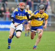 16 March 2008;  Pat Kerwick, Tipperary, in action against Conor Plunkett, Clare. Allianz National Hurling League, Division 1B, Round 4, Clare v Tipperary, Cusack Park, Ennis, Co. Clare. Picture credit; Kieran Clancy / SPORTSFILE