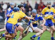 16 March 2008; Eoin Kelly, Tipperary, in action against Gerry O'Grady, Conor Plunkett and Tommy Holldan, Clare. Allianz National Hurling League, Division 1B, Round 4, Clare v Tipperary, Cusack Park, Ennis, Co. Clare. Picture credit; Kieran Clancy / SPORTSFILE
