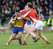 16 March 2008; Gerard Heneghan, Roscommon, in action against Aidan O'Rourke, Armagh. Allianz National Football League, Division 2, Round 4, Armagh v Roscommon, St Oliver Plunkett Park, Crossmaglen, Co. Armagh. Picture credit; Oliver McVeigh / SPORTSFILE