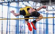 21 March 2015; Ryan Carthy Walshe, Adamstown AC, on his way to winning the Boy's U17 High Jump event during Day one of the GloHealth Juvenile Indoor Track and Field Championships. Athlone International Arena, Athlone, Co.Westmeath.  Picture credit: Pat Murphy / SPORTSFILE