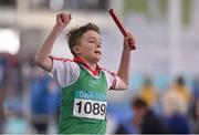 21 March 2015; Mark Carroll, Templemore AC, crosses the finish line to win the Men's U13 4x100m Relay Final event during Day one of the GloHealth Juvenile Indoor Track and Field Championships. Athlone International Arena, Athlone, Co.Westmeath.  Picture credit: Pat Murphy / SPORTSFILE
