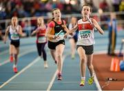 21 March 2015; Sinead Duggan, Galway City Harriers AC, crosses the finish line to win the Women's U13 4x100m Relay Final event during Day one of the GloHealth Juvenile Indoor Track and Field Championships. Athlone International Arena, Athlone, Co.Westmeath.  Picture credit: Pat Murphy / SPORTSFILE