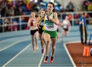 21 March 2015; Ciara Neville, Emerald AC, crosses the finish line to win the Women's U17 4x200m Relay Final event during Day one of the GloHealth Juvenile Indoor Track and Field Championships. Athlone International Arena, Athlone, Co.Westmeath.  Picture credit: Pat Murphy / SPORTSFILE