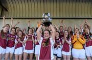 21 March 2015; Glenamaddy Community School captain Nicola Ward lifts the cup as her team-mates celebrate. TESCO All Ireland PPS Senior A Final, Coláiste Dún Iascaigh, Tipperary v Glenamaddy Community School, Galway. Kinnitty, Co. Offaly. Picture credit: Matt Browne / SPORTSFILE