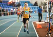 21 March 2015; Michael Farrelly, Portmarnock AC, on his way to winning the Men's U14 4x200m Relay Final event during Day one of the GloHealth Juvenile Indoor Track and Field Championships. Athlone International Arena, Athlone, Co.Westmeath.  Picture credit: Pat Murphy / SPORTSFILE