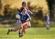21 March 2015; Roisin Howard, Coláiste Dún Iascaigh, in action against Lynsey Noone, Glenamaddy Community School. TESCO All Ireland PPS Senior A Final, Coláiste Dún Iascaigh, Tipperary v Glenamaddy Community School, Galway. Kinnitty, Co. Offaly. Picture credit: Matt Browne / SPORTSFILE