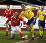 18 March 2008; Mark McAllister, Dungannon Swifts, in action against Barry Johnston, Cliftonville. Setanta Cup Group 1, Cliftonville v Dungannon Swifts, Solitude, Belfast, Co. Antrim. Picture credit: Oliver McVeigh / SPORTSFILE