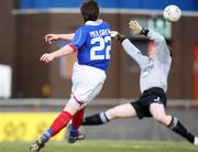 22 March 2008; Linfield's Jamie Mulgrew shoots past Institute goalkeeper Michael Doherty to score a goal. Carnegie Premier League, Linfield v Institute, Windsor Park, Belfast, Co. Antrim. Picture credit; Peter Morrison / SPORTSFILE