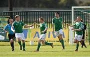 22 March 2015; David Joyce, Clonmel Celtic, second from left, celebrates with team-mates Kevin Waters, Darren Joyce and Ross Condon after scoring his side's first goal. Aviva FAI Junior Cup Quarter-Final, Clonmel Celtic v City Utd. Celtic Park, Clonmel, Co. Tipperary. Picture credit: Diarmuid Greene / SPORTSFILE