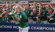 22 March 2015; Ireland captain Niamh Briggs and team-mates celebrate with the Women's Six Nations Rugby Championship trophy. Women's Six Nations Rugby Championship, Scotland v Ireland. Broadwood Stadium, Clyde FC, Glasgow, Scotland. Picture credit: Stephen McCarthy / SPORTSFILE