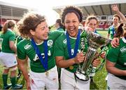 22 March 2015; Ireland's Sophie Spence, right, and Jenny Murphy celebrate with the Women's Six Nations Rugby Championship trophy. Women's Six Nations Rugby Championship, Scotland v Ireland. Broadwood Stadium, Clyde FC, Glasgow, Scotland. Picture credit: Stephen McCarthy / SPORTSFILE
