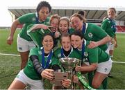 22 March 2015; Tania Rosser and her Ireland team-mates celebrate with the Women's Six Nations Rugby Championship trophy. Women's Six Nations Rugby Championship, Scotland v Ireland. Broadwood Stadium, Clyde FC, Glasgow, Scotland. Picture credit: Stephen McCarthy / SPORTSFILE