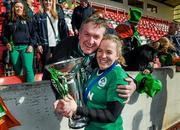 22 March 2015; Ireland captain Niamh Briggs celebrates with her father Mike after her side won the Women's Six Nations Rugby Championship. Women's Six Nations Rugby Championship, Scotland v Ireland. Broadwood Stadium, Clyde FC, Glasgow, Scotland. Picture credit: Stephen McCarthy / SPORTSFILE