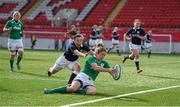 22 March 2015; Alison Miller, Ireland, goes over to score a late try despite the tackle of Eilidh Sinclair, Scotland. Women's Six Nations Rugby Championship, Scotland v Ireland. Broadwood Stadium, Clyde FC, Glasgow, Scotland. Picture credit: Stephen McCarthy / SPORTSFILE