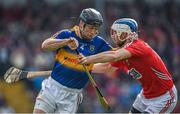 22 March 2015; Conor O'Brien, Tipperary, in action against Luke O'Farrell, Cork. Allianz Hurling League Division 1A, round 5, Cork v Tipperary, Páirc Uí Rinn, Cork. Photo by Sportsfile