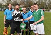 22 March 2015; City Utd captain Keith Nibbs and Clonmel Celtic captain Craig Condon exchange pendants and a handshake in the company of match officials, from left to right, assistant referee Brian Higgins, referee Donal Power, and assistant referee Nigel Casey, before the game. Aviva FAI Junior Cup Quarter-Final, Clonmel Celtic v City Utd. Celtic Park, Clonmel, Co. Tipperary. Picture credit: Diarmuid Greene / SPORTSFILE