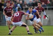 22 March 2015; Niall Donoher, Laois, in action against Sean Denvir and Finian Hanley, Galway. Allianz Football League Division 2, round 3, Galway v Laois, Tuam Stadium, Tuam, Co. Galway. Picture credit: Ray Ryan / SPORTSFILE