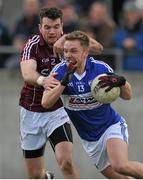 22 March 2015; Ross Munnelly, Laois, in action against Johnny Duane, Galway. Allianz Football League Division 2, round 3, Galway v Laois, Tuam Stadium, Tuam, Co. Galway. Picture credit: Ray Ryan / SPORTSFILE
