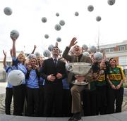 19 March 2008; Ulster Bank employees and GAA rivals Kieran Donaghy, Kerry, and Bryan Cullen, Dublin, with fellow Ulster Bank staff as they celebrate the GAA's new sponsorship announcement. The bank has signed a three year deal as one of the title sponsors of the GAA All-Ireland Football Championships. Ulster Bank Headquarters, George's Quay, Dublin. Picture credit: Brian Lawless / SPORTSFILE