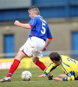 22 March 2008; Willam Murphy, Linfield, in action against Ruari Boyle, Institute. Carnegie Premier League, Linfield v Institute, Windsor Park, Belfast, Co. Antrim. Picture credit; Peter Morrison / SPORTSFILE
