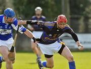 23 March 2008; Pat Kerwick, Tipperary, in action against James Young, Laois. Allianz National Hurling League, Division 1A, Round 5, Tipperary v Laois, Leahy Park, Cashel, Co. Tipperary. Picture credit; David Maher / SPORTSFILE