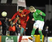 25 March 2008; Andy Keogh, Republic of Ireland, beats Siobodan Lakicevic, Montenegro, to score his side's first goal. UEFA U21 European Championship Qualifier, Republic of Ireland v Montenegro, Terryland Park, Galway. Picture credit; David Maher / SPORTSFILE