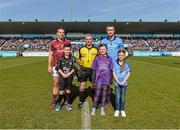 22 March 2015; Captains David Collins, Galway, and Peter Kelly, Dublin, and referee Johnny Ryan with mini-games referee Eoin Abernethy, aged 9, from Holy Trinity School Donaghmede, and team mascots, both from St Mary's National School Fairview, Kadie-Jade Martin, aged 9, and Leah Dunne, aged 9, before the game. Allianz Hurling League Division 1A, round 5, Dublin v Galway, Parnell Park, Dublin. Picture credit: Piaras O Midheach / SPORTSFILE