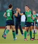 22 March 2015; Emma Smyth, Ireland, is congratulated by Anna O'Flanagan, right, after scoring during the penalty shoot out. Ireland v Canada - World Hockey League 2 Final, National Hockey Stadium, UCD, Belfield, Dublin. Picture credit: Brendan Moran / SPORTSFILE