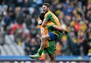 17 March 2015; Corofin's Michéal Lundy, left, and Daithí Burke celebrate at the final whistle. AIB GAA Football All-Ireland Senior Club Championship Final, Corofin, Co. Galway v Slaughtneil, Co. Derry. Croke Park, Dublin. Picture credit: Ramsey Cardy / SPORTSFILE