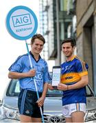 24 March 2015; Cathal Barrett, Tipperary hurler, Ciarán Kilkenny, Dublin footballer, Cian O’Callaghan, Dublin hurler, and Sarah McCaffrey, Dublin ladies footballer, were on hand to launch the AIG XLNTdriver App; an easy and simple to use app that rewards safe drivers by reducing their car insurance premiums. Further details are available at www.aig.ie or customers can call 1890 27 27 27 with queries. Pictured at the launch are, from left, hurlers Cian O'Callaghan, Dublin, and Cathal Barrett, Tipperary. Sir John Rogerson’s Quay, Dublin. Picture credit: Brendan Moran / SPORTSFILE