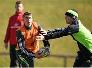 24 March 2015; Munster's Ian Keatley in action against Tyler Bleyendaal during squad training. Munster Rugby Squad Training. University of Limerick, Limerick. Picture credit: Diarmuid Greene / SPORTSFILE
