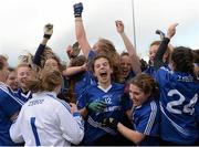 24 March 2015; John the Baptist's Anna-Rose Kennedy, 12, celebrates with her team-mates after the game. TESCO All Ireland PPS Junior B Final, St Michael's Lurgan, Armagh, v John the Baptist, Limerick. Kinnegad, Westmeath. Picture credit: Piaras O Midheach / SPORTSFILE