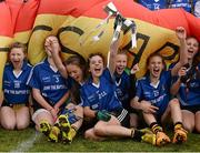 24 March 2015; John the Baptist's Anna-Rose Kennedy and her team-mates celebrate with the cup after the game. TESCO All Ireland PPS Junior B Final, St Michael's Lurgan, Armagh, v John the Baptist, Limerick. Kinnegad, Westmeath. Picture credit: Piaras O Midheach / SPORTSFILE