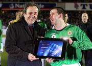 26 March 2008; UEFA President Michel Platini presents Northern Ireland's David Healy with a special award in recognition of his 13 goals he scored in the Euro 2008 qualifying campaign. International Friendly, Northern Ireland v Georgia, Windsor Park, Belfast, Co. Antrim. Picture credit; Oliver McVeigh / SPORTSFILE