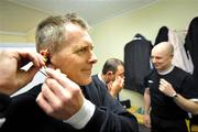 28 March 2008; Referee Hugo Whoriskey, adjusts his new headset in the referee's dressing room that will keep him in constant communication with his assistants during the game. eircom League Premier Division, Bray Wanderers v St Patrick's Athletic, Carlisle Grounds, Bray. Picture credit: David Maher / SPORTSFILE *** Local Caption ***
