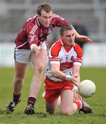 30 March 2008; James Conway, Derry, in action against Barry Cullinane, Galway. Allianz National Football League, Division 1, Round 5, Galway v Derry, Pearse Stadium,. Galway. Picture David Maher / SPORTSFILE
