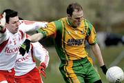 30 March 2008; Kevin Rafferty, Donegal, in action against Conor Gormley, Tyrone. Allianz National Football League, Round 5, Tyrone v Donegal, Edendork, Co Tyrone. Picture credit; Michael Cullen / SPORTSFILE