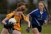 24 March 2015; Elisha Donnelly, St Michael's Lurgan, in action against Katie Heelan, Lucy Ryan-Clarke, John the Baptist. TESCO All Ireland PPS Junior B Final, St Michael's Lurgan, Armagh, v John the Baptist, Limerick. Kinnegad, Westmeath. Picture credit: Piaras O Midheach / SPORTSFILE