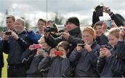 24 March 2015; John the Baptist supporters take pictures after the game. TESCO All Ireland PPS Junior B Final, St Michael's Lurgan, Armagh, v John the Baptist, Limerick. Kinnegad, Westmeath. Picture credit: Piaras O Midheach / SPORTSFILE