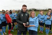 25 March 2015; Karl Keogh from the FAI presents Leah Phillips, Athlone Institute of Technology, with her player of the match trophy. WSCAI Challenge Cup Final, Athlone Institute of Technology v North West Regional College, Leixlip United, Collinstown, Leixlip, Co. Kildare. Picture credit: Matt Browne / SPORTSFILE