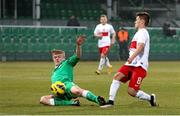 26 March 2015; Jonathon Lunney, Republic of Ireland, in action against Mateusz Ostaszewski, Poland. UEFA U17 Championships Elite Phase, Group 4, Republic of Ireland v Poland. Stadium Groclin Dyskobolia, Grodzisk Wielkopolski, Poland. Picture credit: Jakub Piasecki / SPORTSFILE