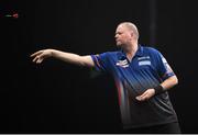 26 March 2015; Raymond van Barneveld competes against Michael van Gerwen during the Betway Premier League Darts at the 3Arena, Dublin. Picture credit: Stephen McCarthy / SPORTSFILE
