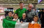 27 March 2015; Republic of Ireland's Conor Livingston with Tommy Watters, and front row, from left, Caleb Watters, aged 6, Eimear Livingston, aged 8, Aalayiah Watters, aged 9, and Cian Livingston, aged 10, all from Gorey, Co. Wexford, on the team's arrival at Dublin Airport after qualifying for the UEFA U17 Championships. Dublin Airport, Dublin. Picture credit: Piaras O Midheach / SPORTSFILE