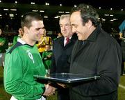 26 March 2008; UEFA President Michel Platini presents Northern Ireland's David Healy with a special award in recognition of his 13 goals he scored in the Euro 2008 qualifying campaign.Also pictured is Irish FA President Raymond Kennedy, centre. International Friendly, Northern Ireland v Georgia, Windsor Park, Belfast, Co. Antrim. Picture credit; SPORTSFILE - Pool picture by William Cherry